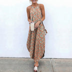 Woman wearing a floral dress with a white background and '100% Rayon' text.